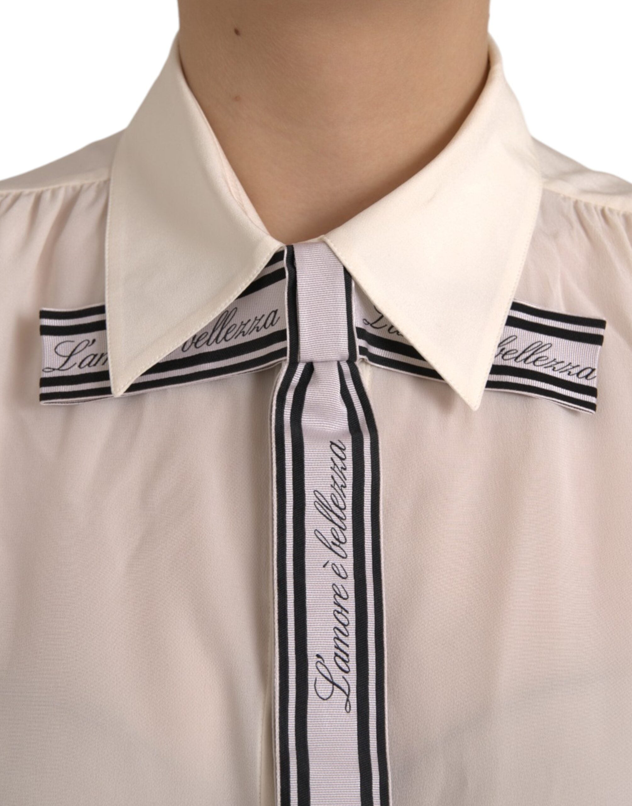White long-sleeved blouse top with button placket
