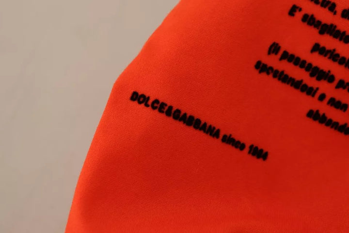 Dolce & Gabbana Orangefarbenes T-Shirt aus Baumwolle mit Rundhalsausschnitt und Logodruck