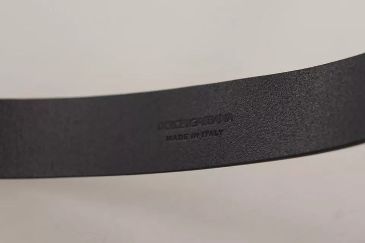 Black calfskin belt with engraved logo and metal buckle