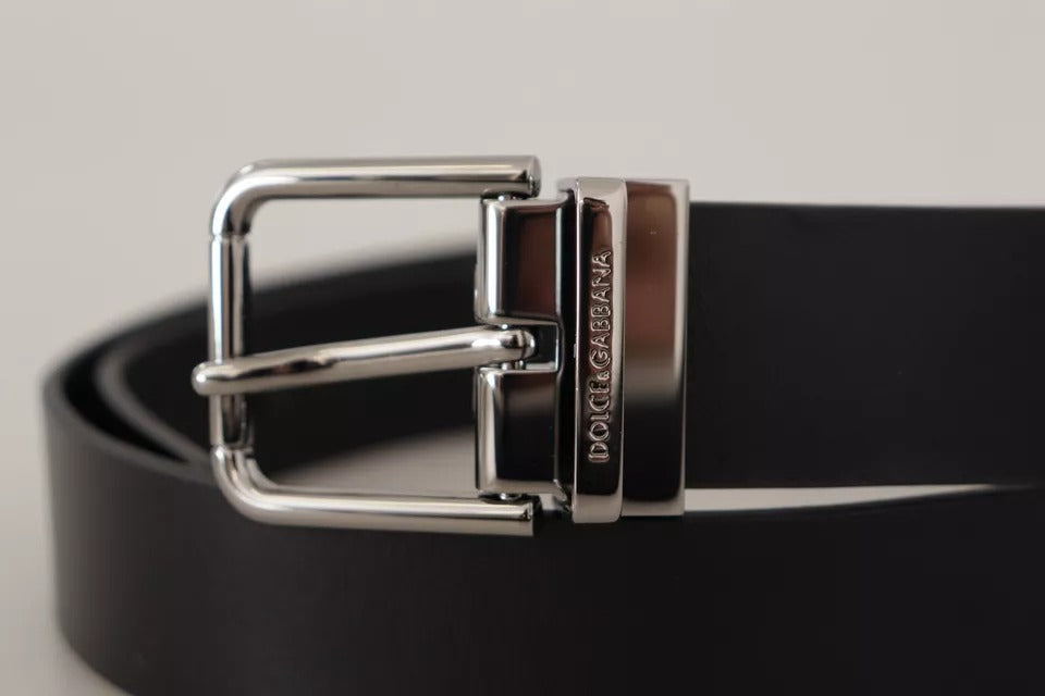 Black calfskin belt with engraved logo and metal buckle