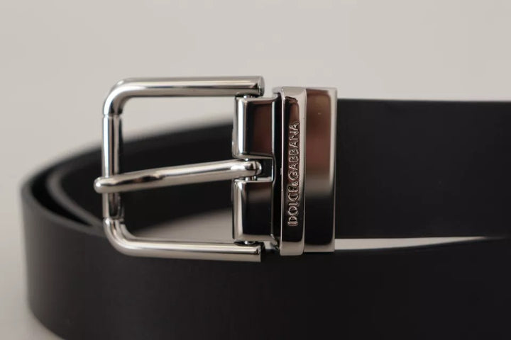 Black calfskin belt with engraved logo and metal buckle