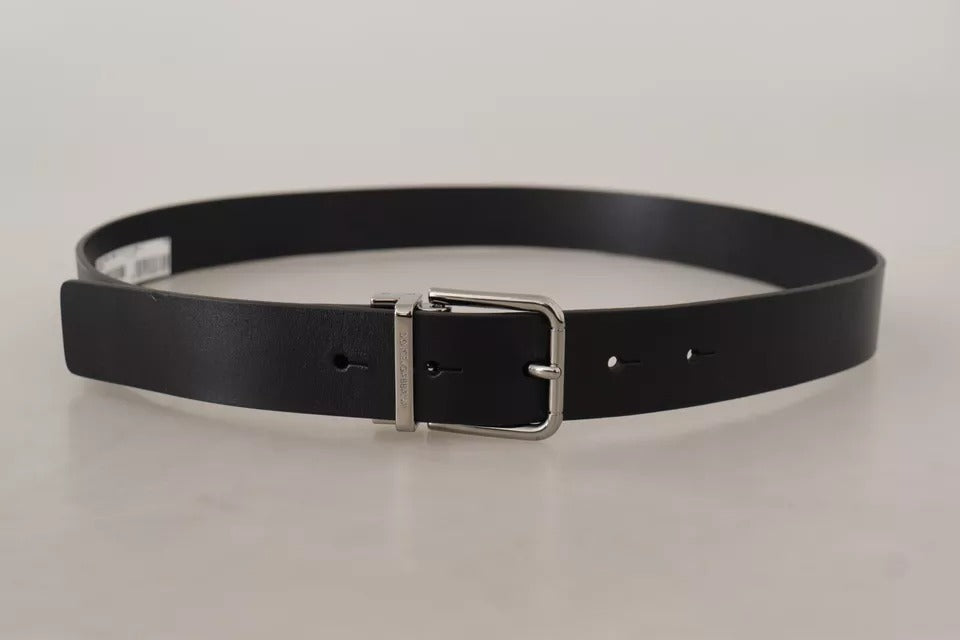 Black calfskin belt with engraved logo and metal buckle