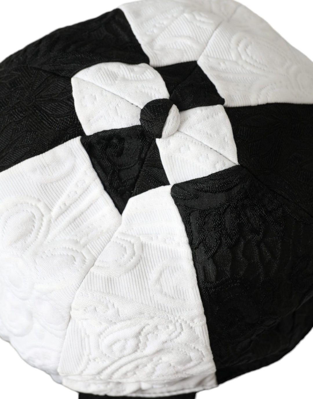 Black and white checked floppy hat with a wide brim