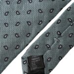 Green patterned men's tie made of 100% silk