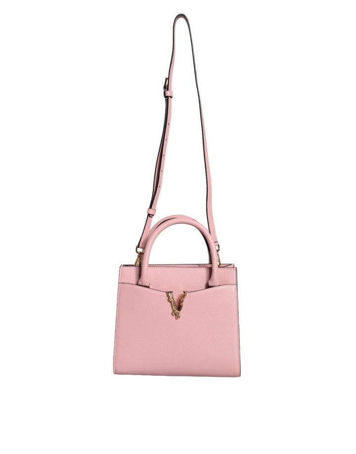 Pink crossbody bag with small handle made of grained calfskin