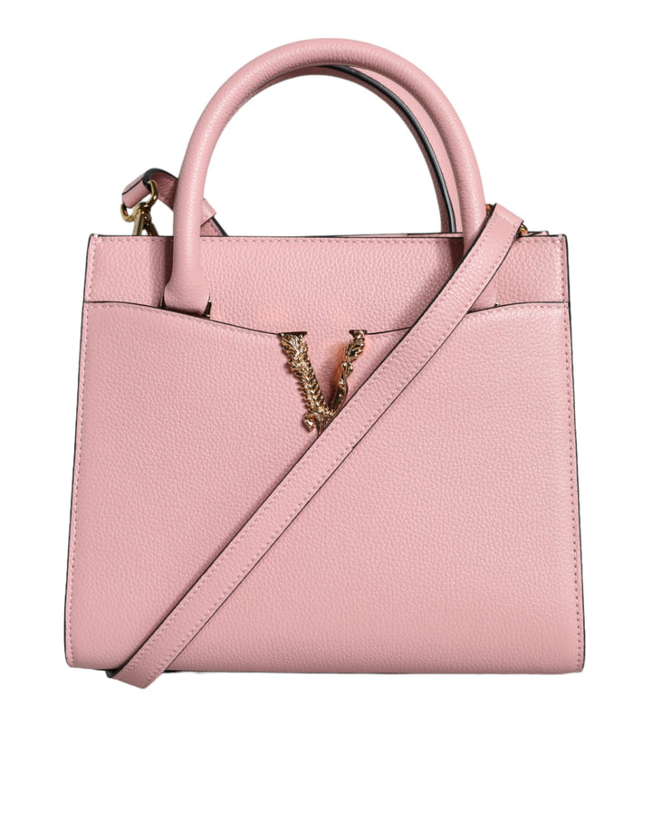 Pink crossbody bag with small handle made of grained calfskin