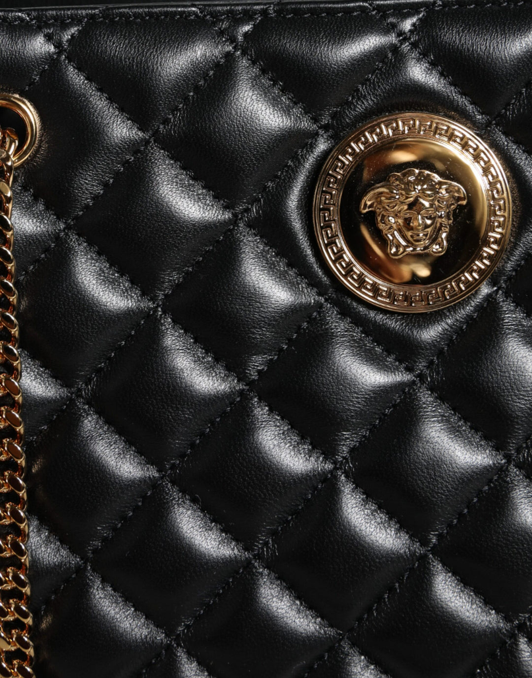 Black quilted nappa leather shoulder bag with chain strap