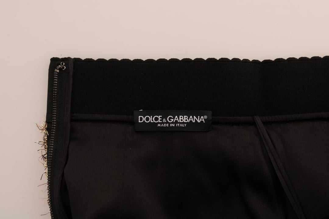 Dolce & Gabbana Eleganter taillenhoher Bleistiftrock mit goldenen Fransen