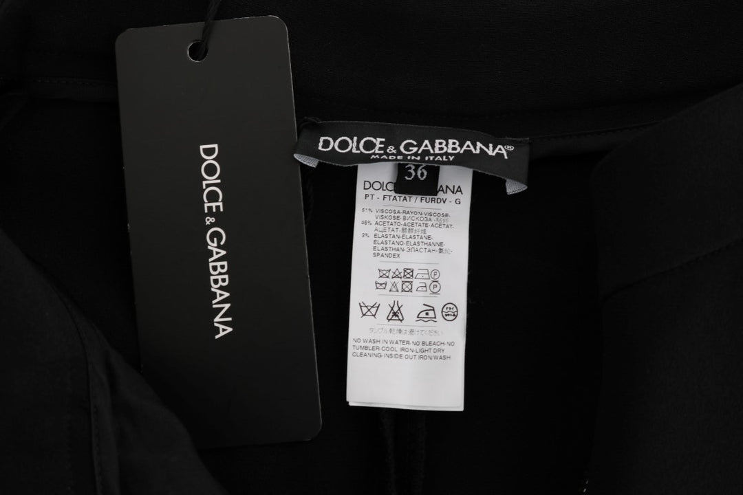 Dolce & Gabbana Schicke schwarze Capri-Hose mit rosa Seitenstreifen