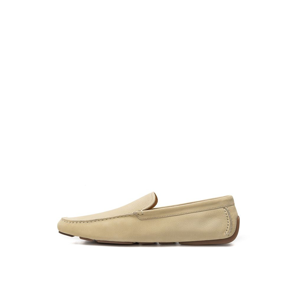Beige leather slippers